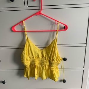 yellow tank top
